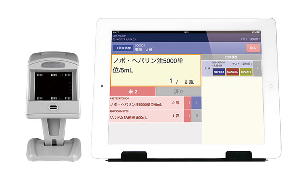 最終鑑査支援システム F-AUDIT バーコードリーダーとモニター